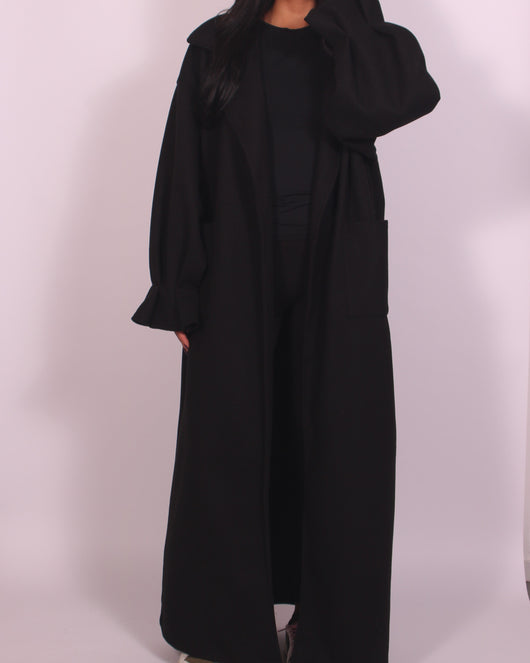 Elegant lång svart klänning med avslappnad silhuett – enkel stil för varje dag